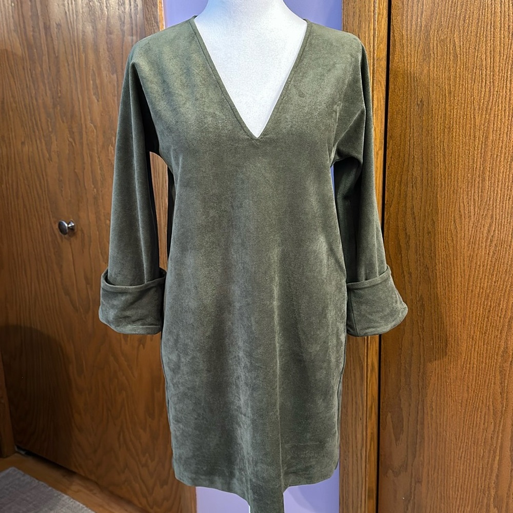 This is a faux suede olive green mini dress size XXS.